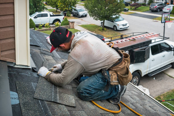 Professional Flat Roof Repair technician working in Southold, NY